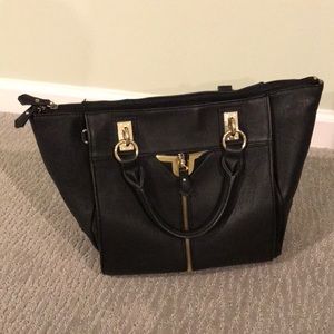 Danielle Nicole Black bag with gold accents